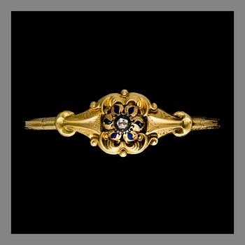 A BRACELET, 18K gold, diamnod, enamel decoration. Indistinct maker's mark Stockholm 1847. Weight 17.8 g.