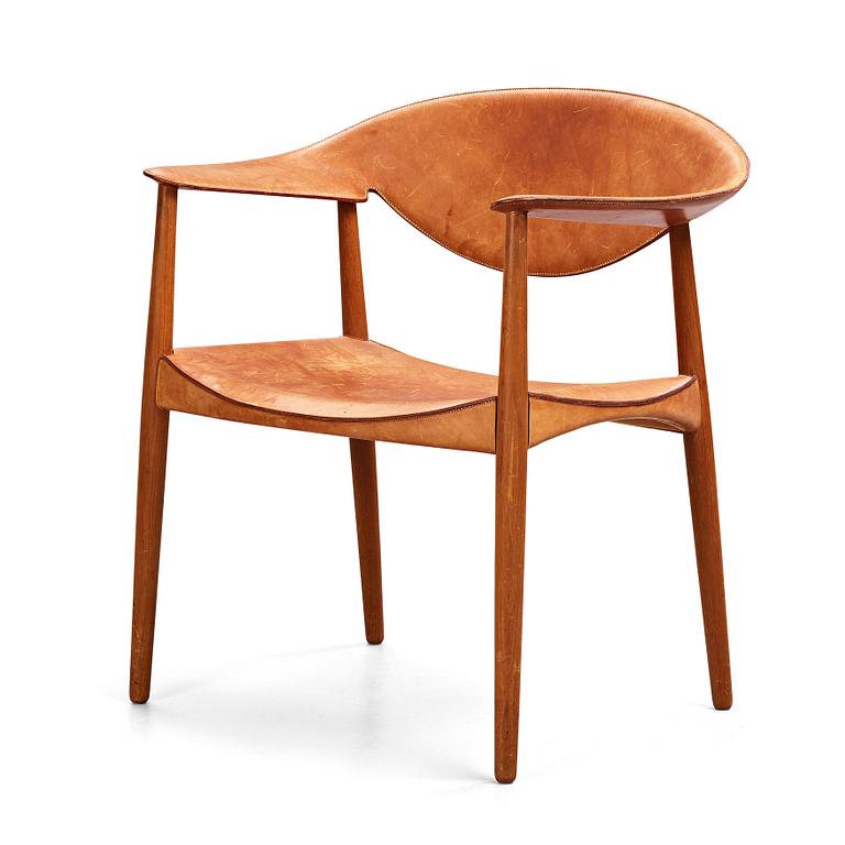 Aksel Bender Madsen & Ejner Larsen, a teak and leather "Metropolitan Chair", Willy Beck, Denmark 1950-60's.