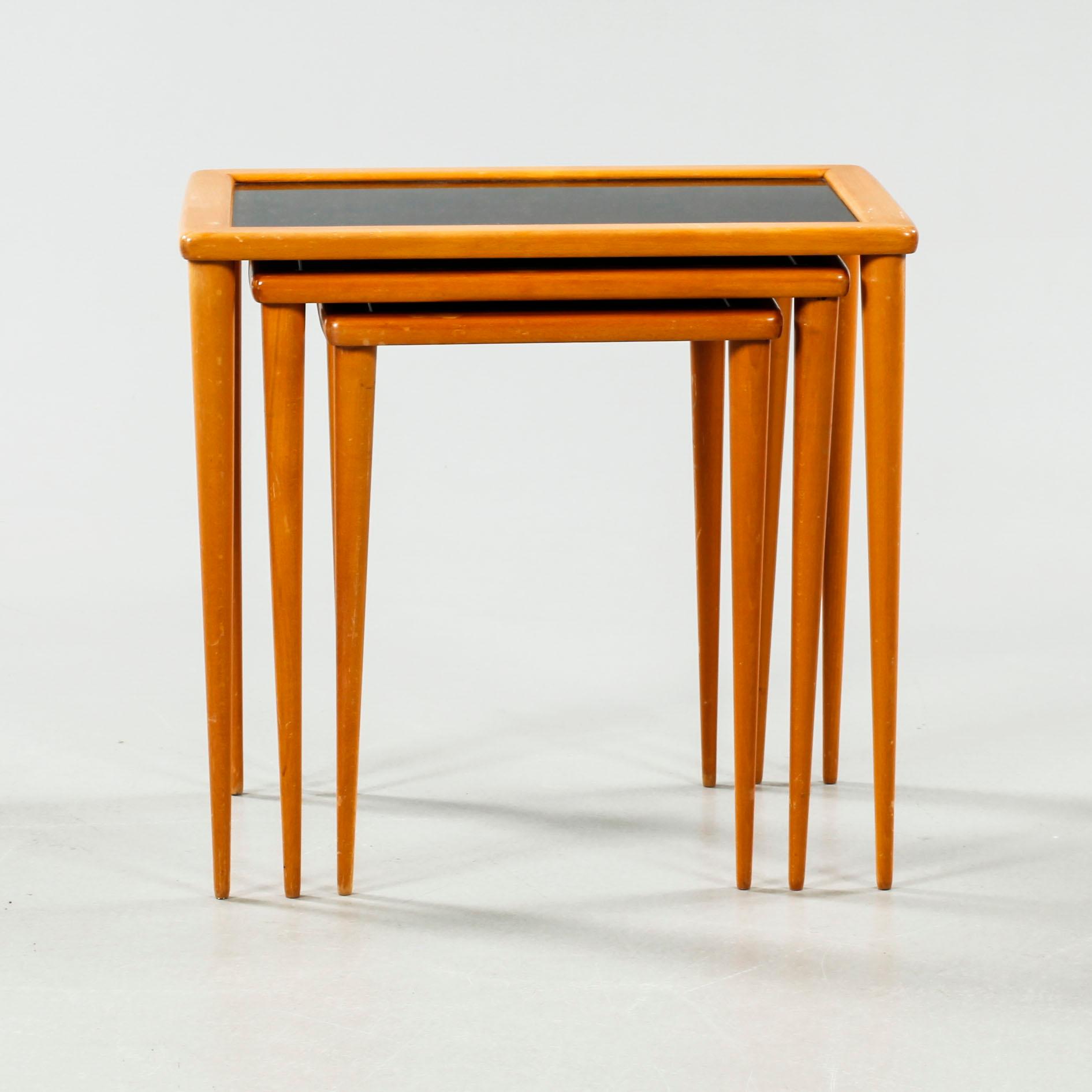 An nest of table of three pieces from the second half of the 20th century.