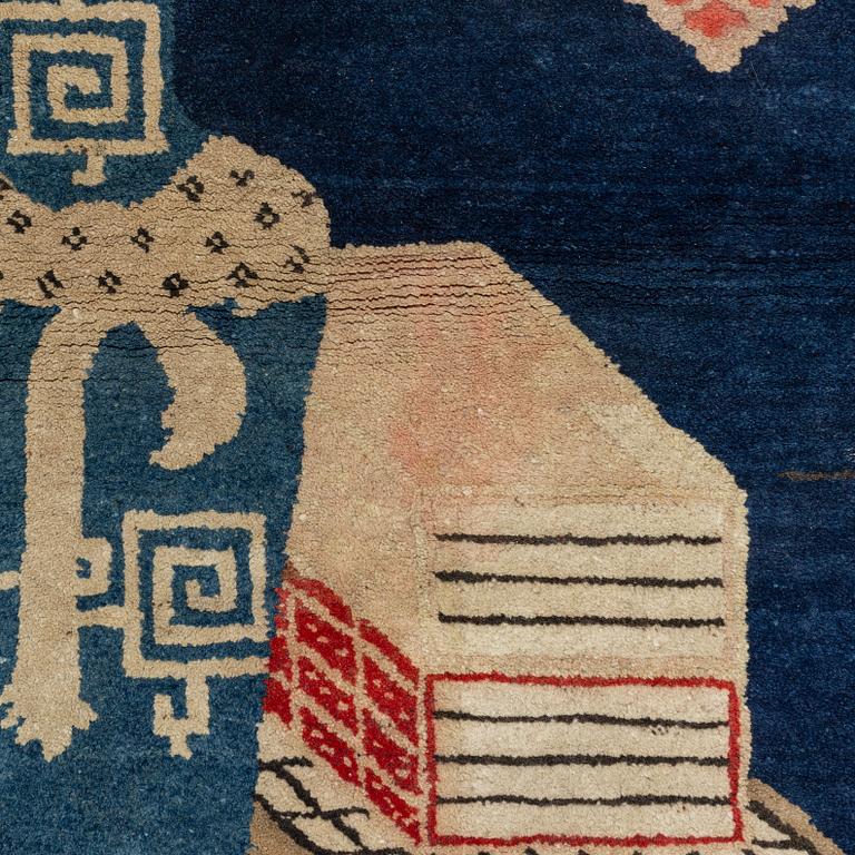 A Boutou rug, China, c. 145 x 75 cm.