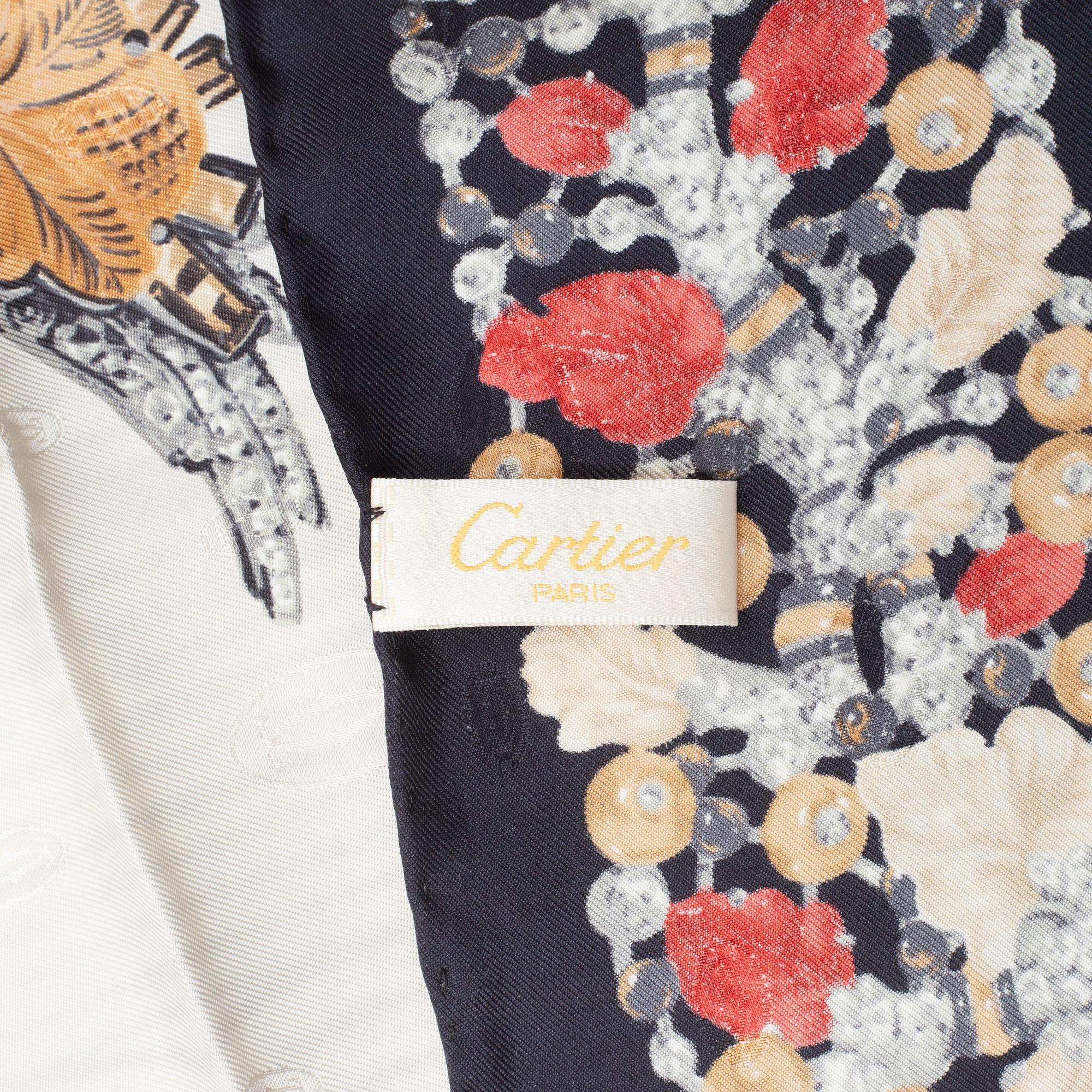 Cartier, a jacquard silk scarf.