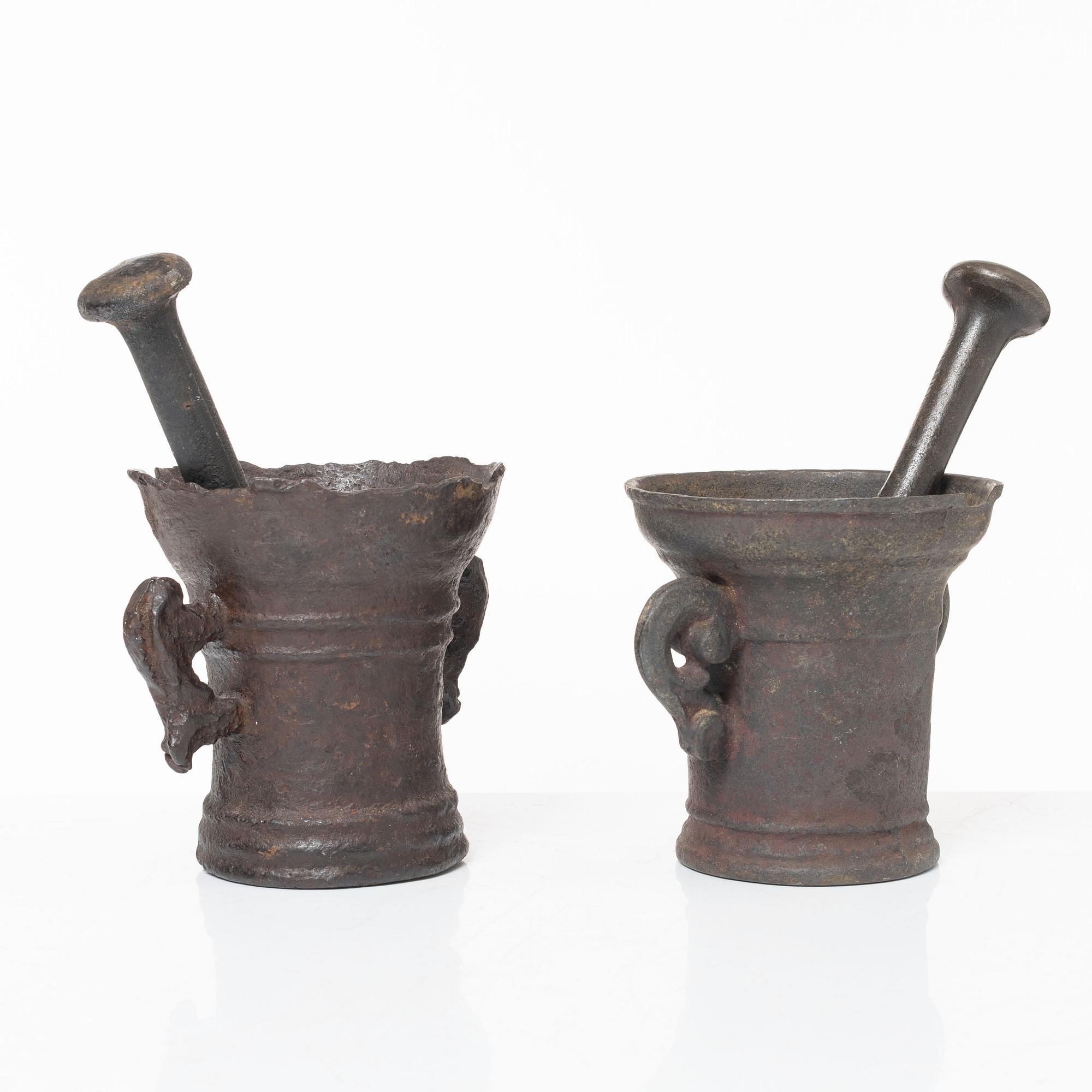 A set of two renaissance-type cast-iron mortars, 17th century.
