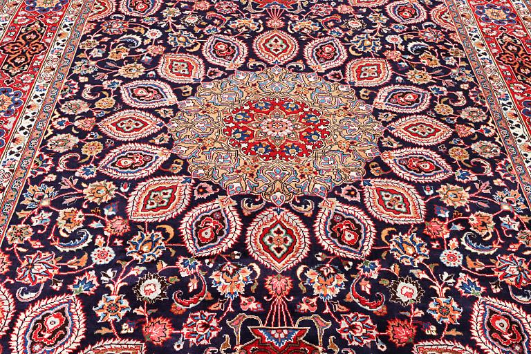 A Meshed carpet, c. 352 x 253 cm.
