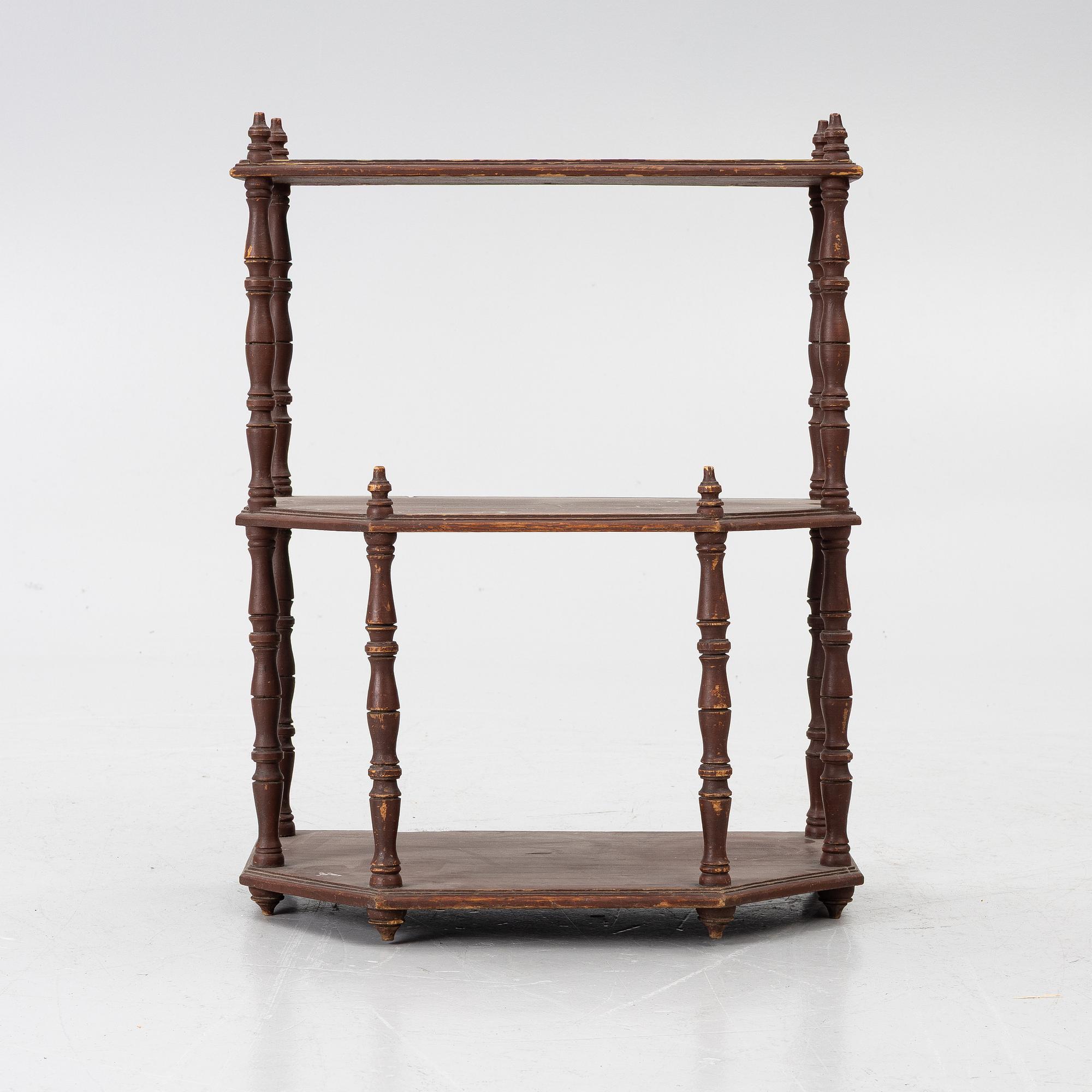 A wall shelf, 19th Century.