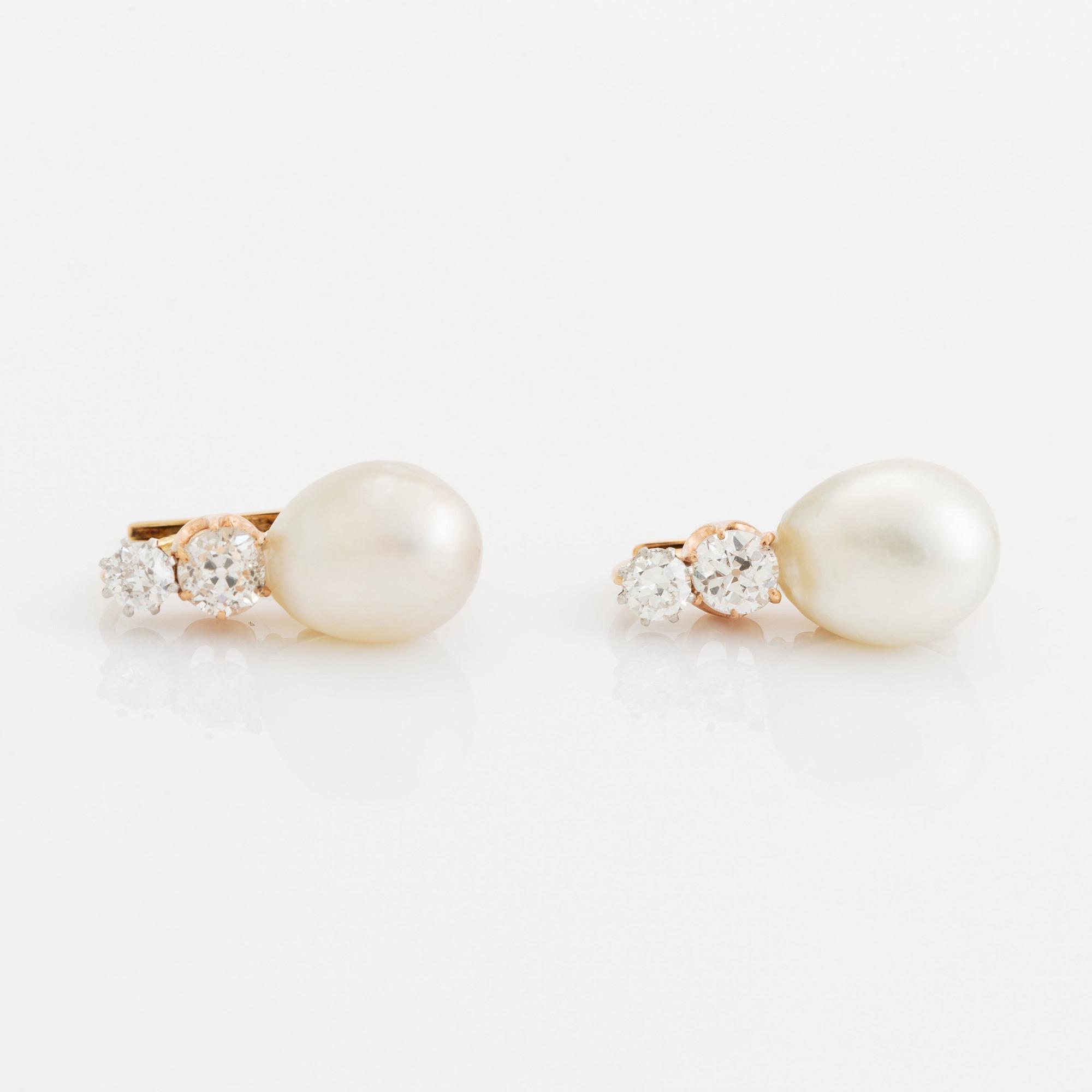 A pair of 18K gold and pearl earrings set with old-cut diamonds.
