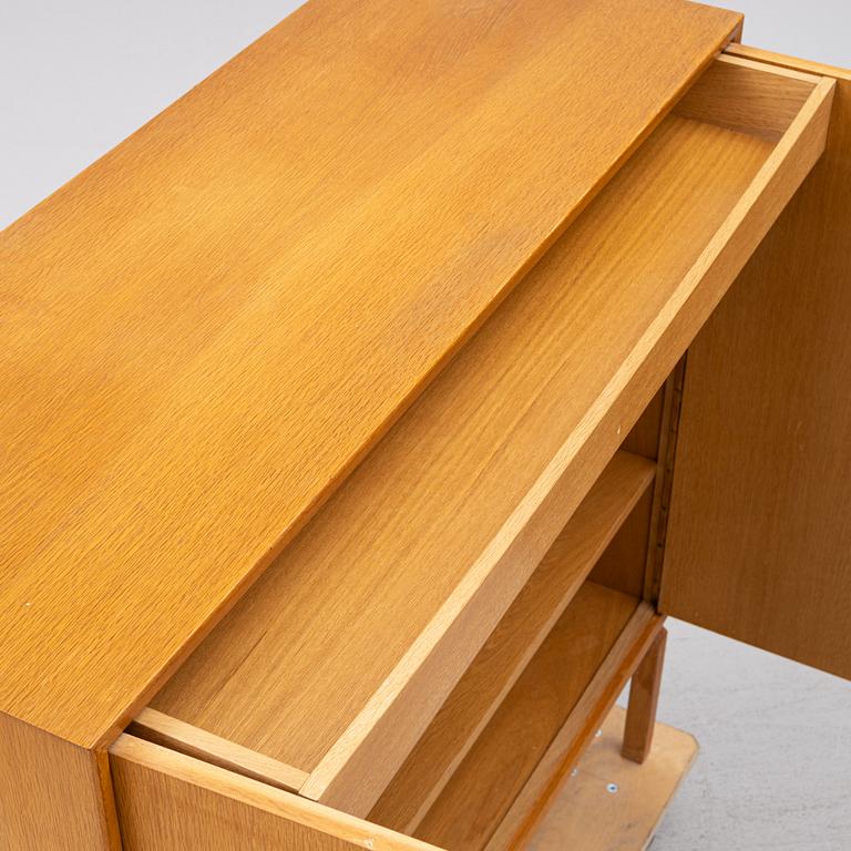An oak cabinet, second half of the 20th century.