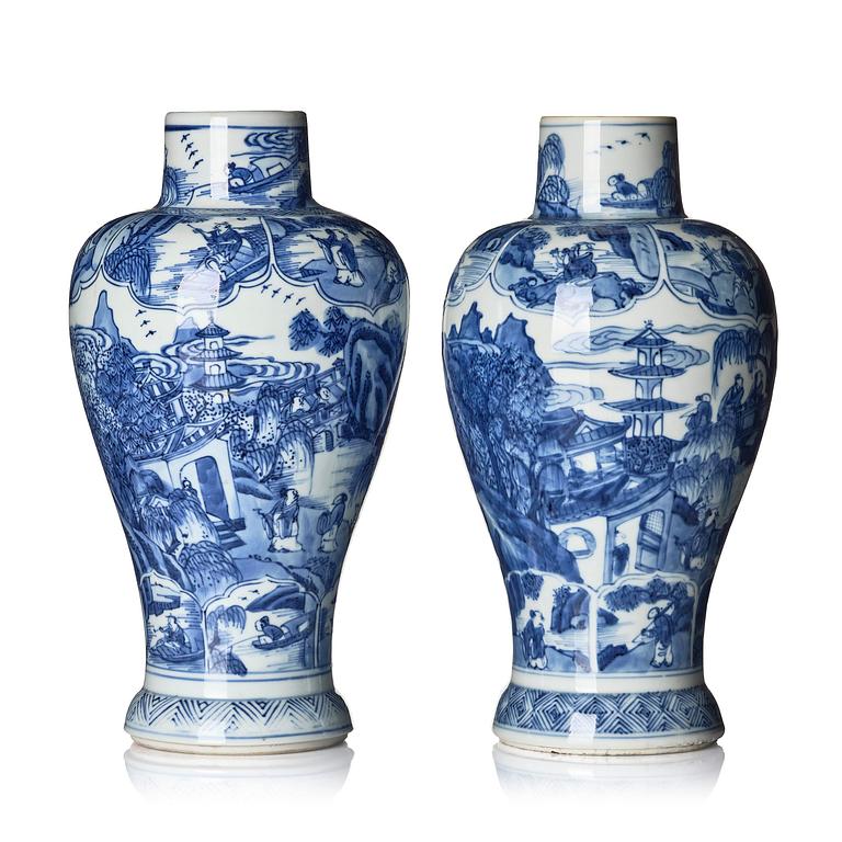A pair of blue and white 'landscape' vases, Qing dynasty, Kangxi (1662-1722).