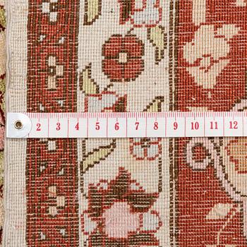 A semi-antique Turkish silk rug, c. 200 x 130 cm.