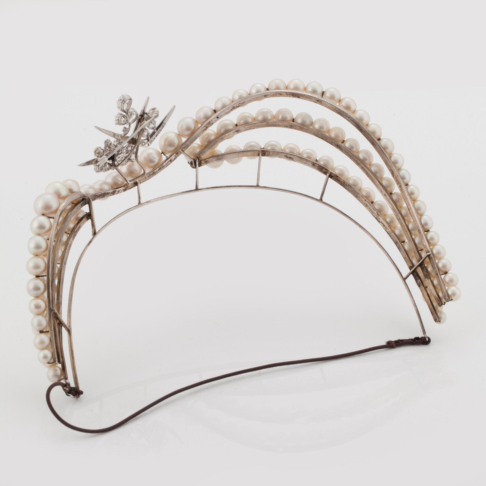 A TIARA with cultured pearls and a detachable brooch set with old-cut diamonds.
