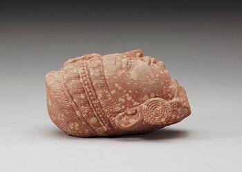 A mottled red sandstone head of Guanyin, Mathura, India, presumably 200-500 AD.