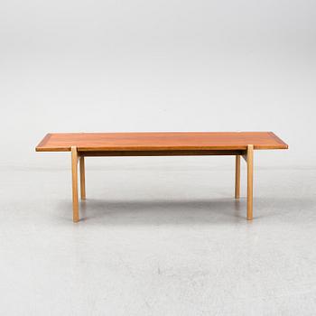 A model JH 575 coffee table by Hans J Wegner for Johannes Hansen.