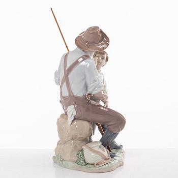 Lladro, two figurines, Salvador Furió, "A fishing lesson", and José Puché, "Fishing with gramps", Spain.