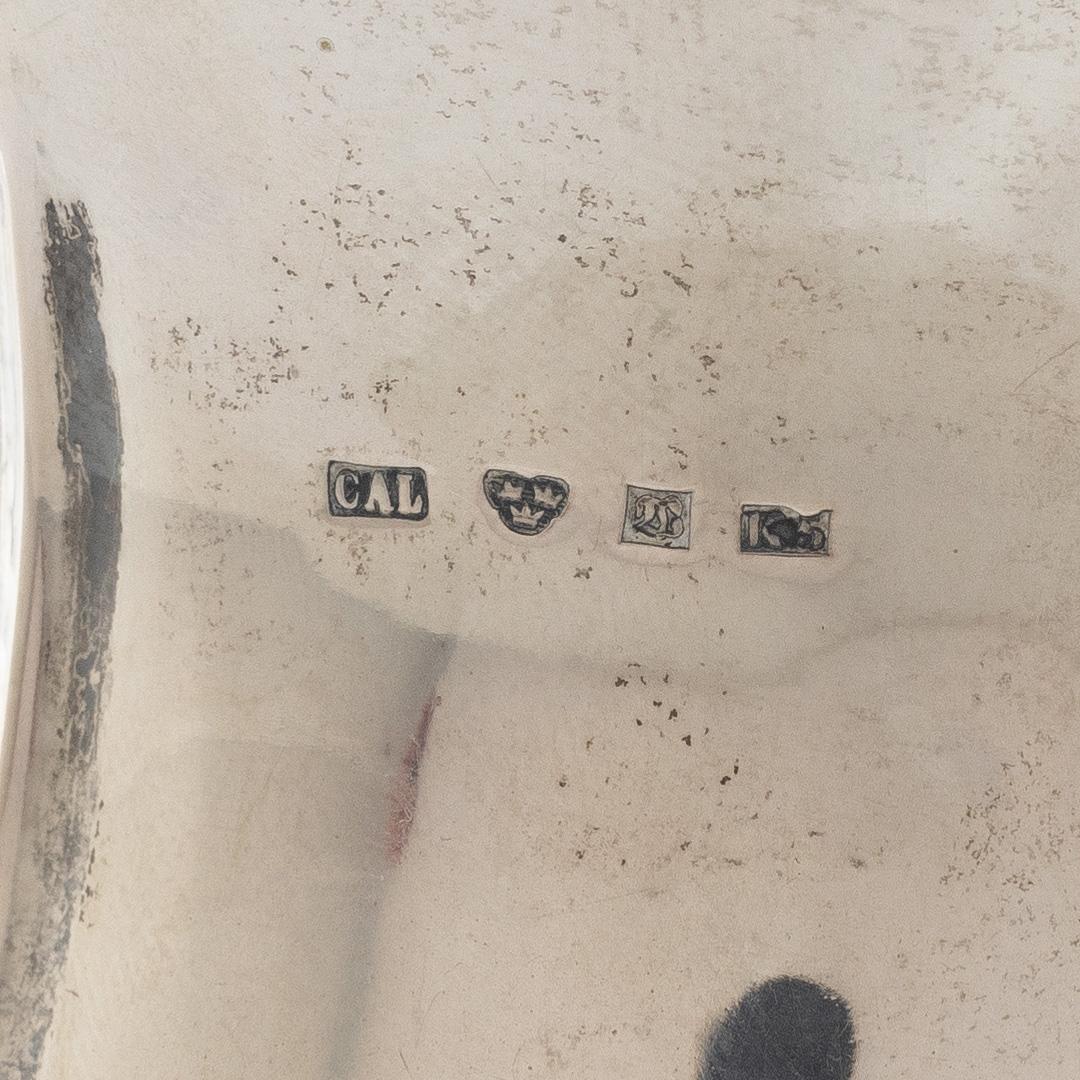 A Swedish silver beaker and a jug, including CG Hallberg, Stockholm 1927.