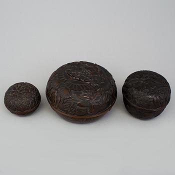 Three Japanese wooden boxes with covers, early 20th Century.