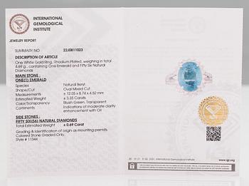 A 14K white gold ring with a ca 3.35 ct emerald and diamonds ca. 0.69 ct in total. IGI certificate.