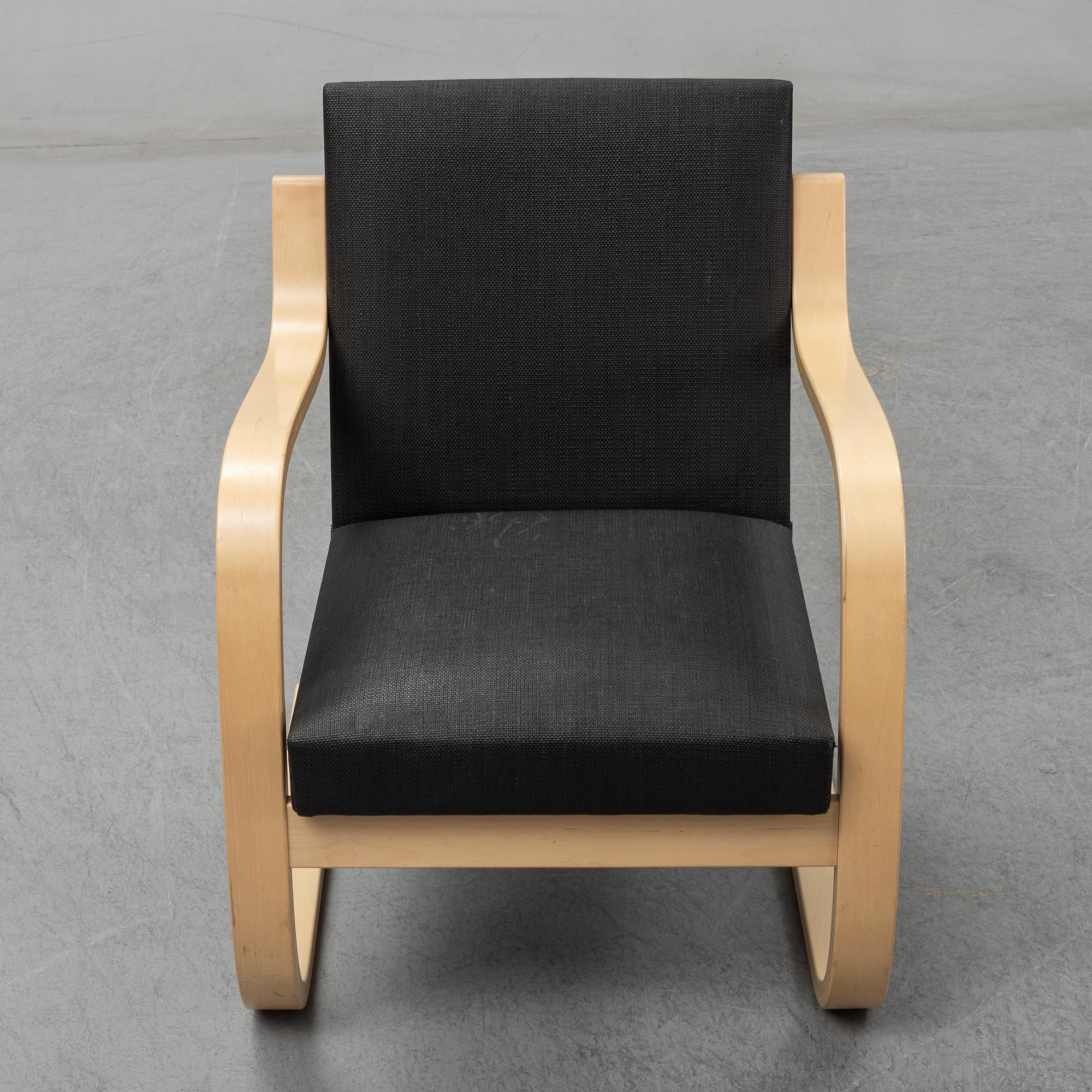 Alvar Aalto, a pair of model 406  birch armchairs, Artek, Finland, 2002.