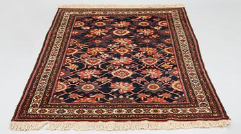 A Hamadan rug of 'Mina Khani design'. Circa 197 x 131 cm.