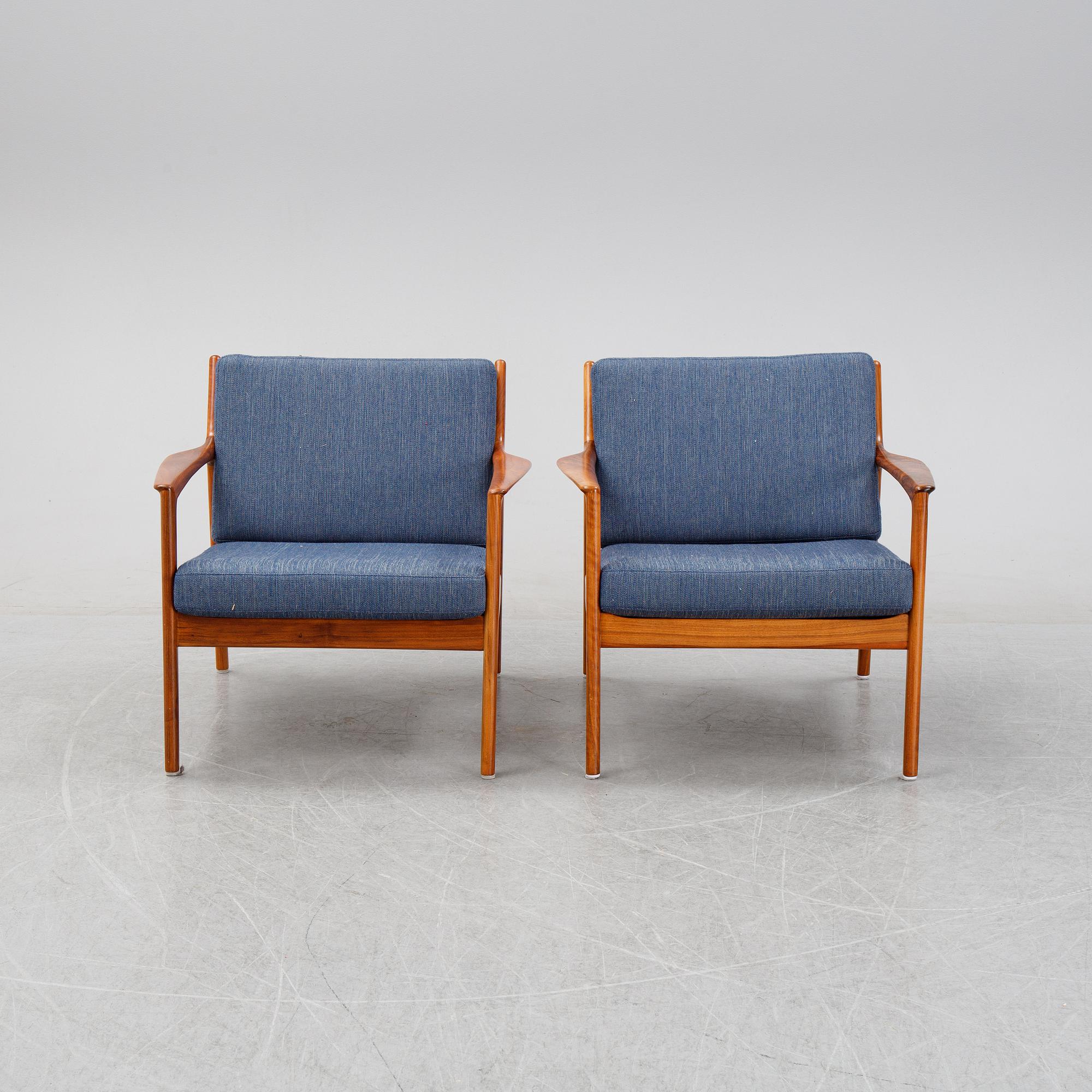 Folke Ohlsson, a pair of teak 'USA 75' easychairs, Dux, designed in 1963.