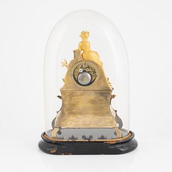 A Louis XV-style table clock, late 19th century.