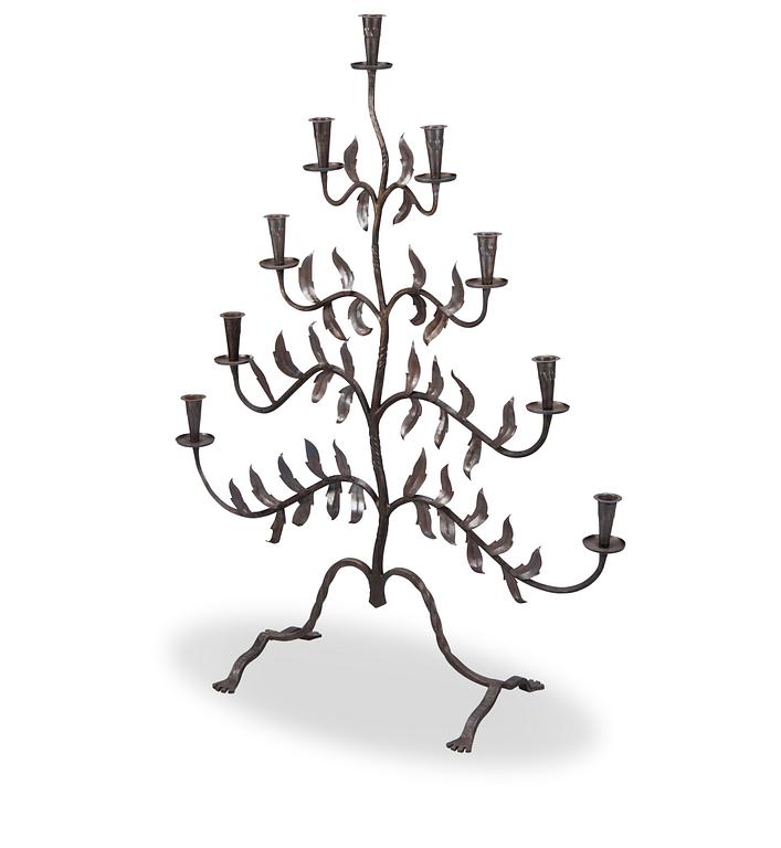 Paavo Tynell, A wrought iron floor candelabrum, oy Taito ab, dated 1926.