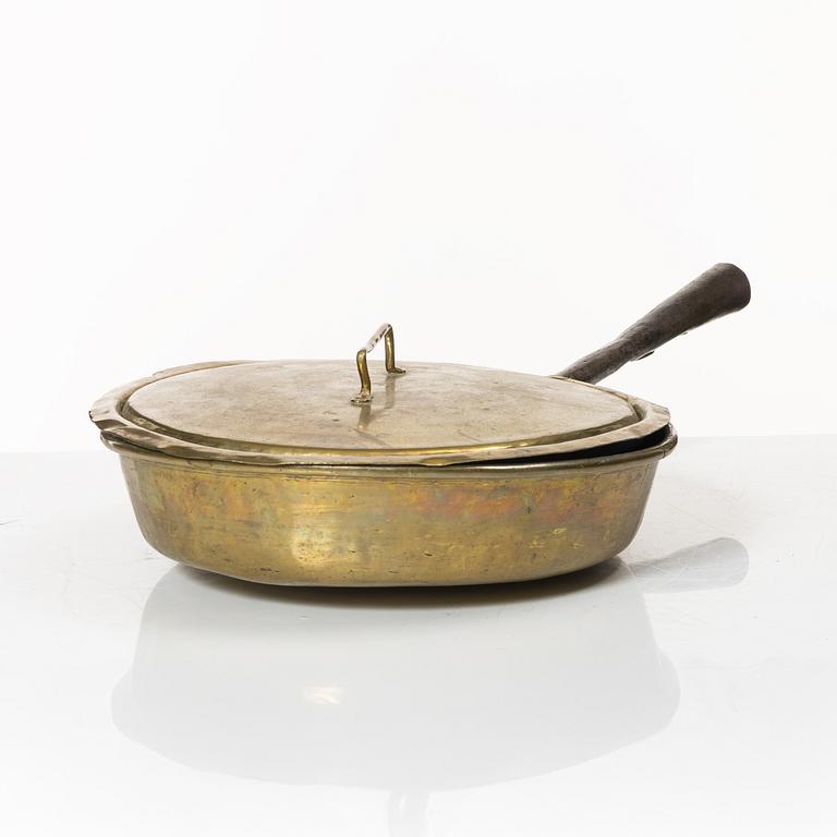 A Swedish brass lidded saucepan, 18th century.