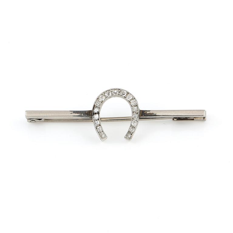 SLIPSNÅL, 18 karat guld och diamanter. Hugo Strömdahl, Stockholm 1948. Vikt 2,6 gram.