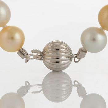 A cultured South Sea pearl necklace with a clasp in 18K white gold.