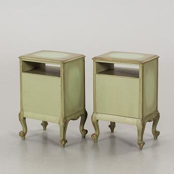 A PAIR OF BEDSIDE TABLES.