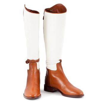 399. RALPH LAUREN, a pair of white canvas and leather boots. Size US 8.