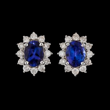 76. A pair of tanzanite, total circa 2.95 cts, and diamond, total circa 1.00 ct, earring.