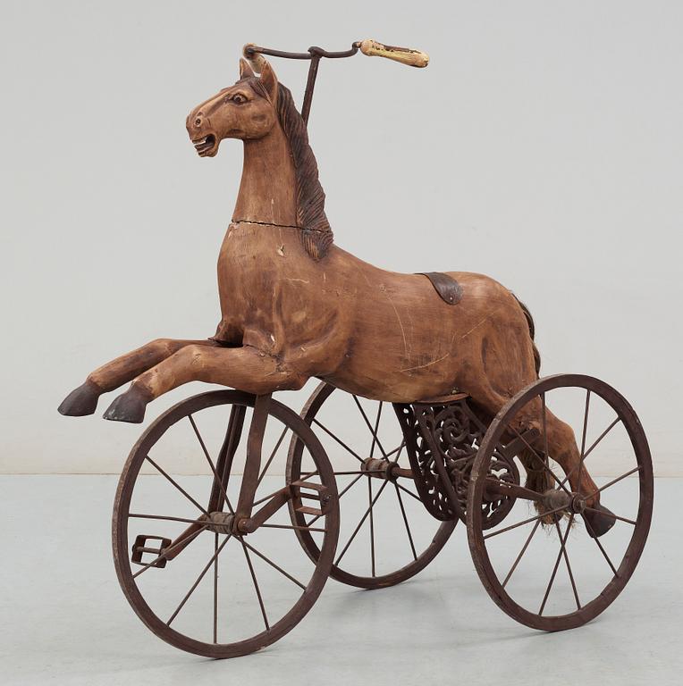 HÄSTTREHJULING, trä och gjutjärn, 1900-tal.