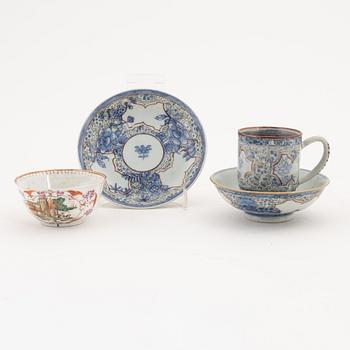 A famille rose cup with stand, a dish and a single cup, Qing dynasty, Qianlong (1736-95).