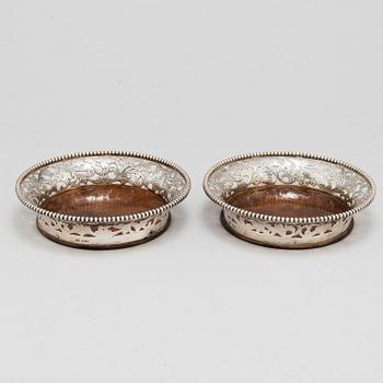 A pair of sterling silver coasters, late 20th Centrury.