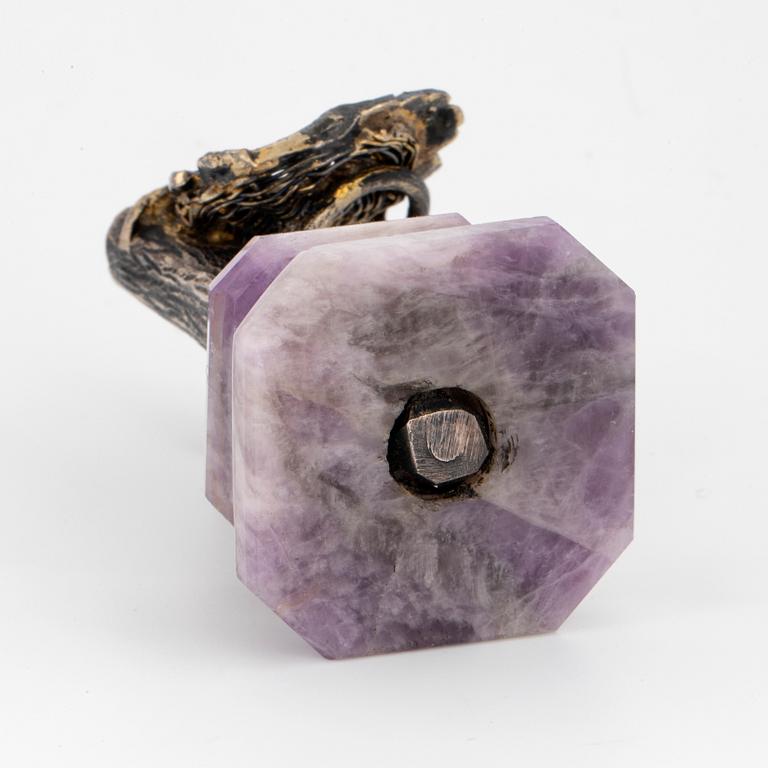 Silver and coloured stone bird sculpture.