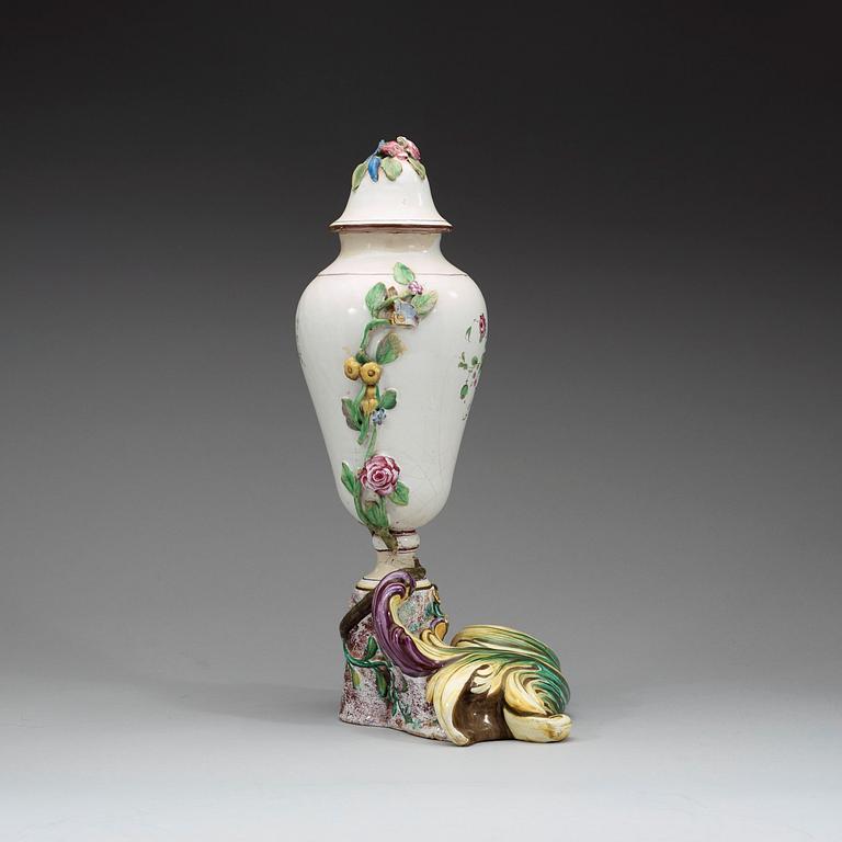 A Swedish Marieberg faience vase with cover, dated 1771.