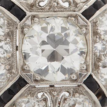 Ring platina med en gammalslipad diamant vikt ca 0.80 ct kvalitet ca H/I i.