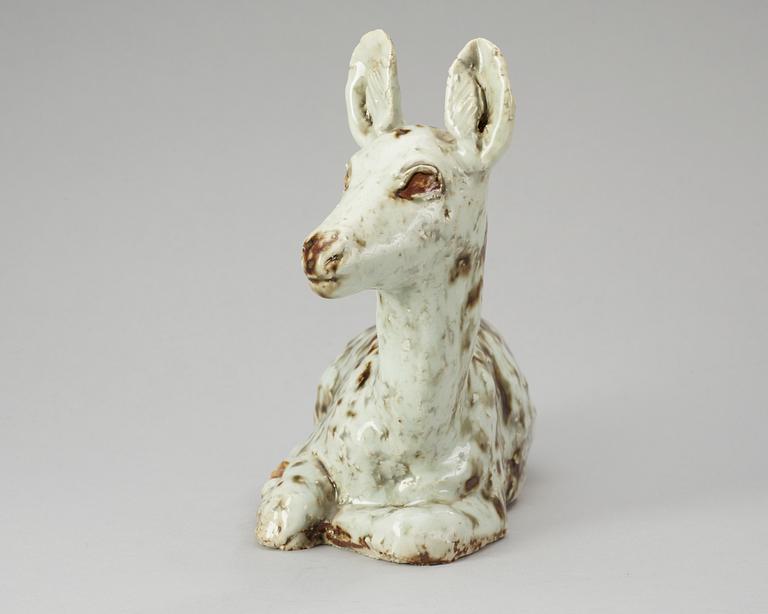 A Michael Schilkin stoneware sculpture of a deer, Arabia.