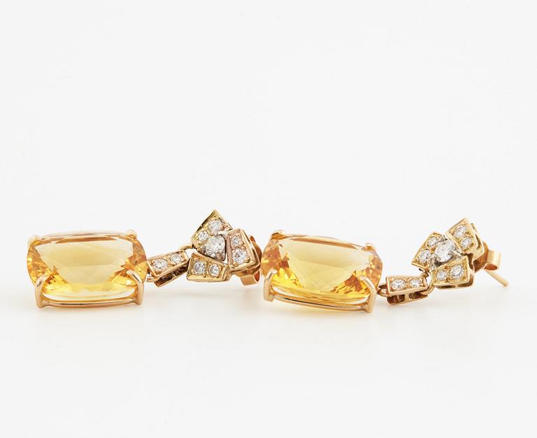 Faceted citrines and diamond earrings.