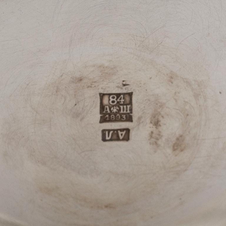 A Russian 19th century parcel-gilt silver tea pot and cream jug, mark possbly of Alexander Lokin, St. Petersburg 1893.