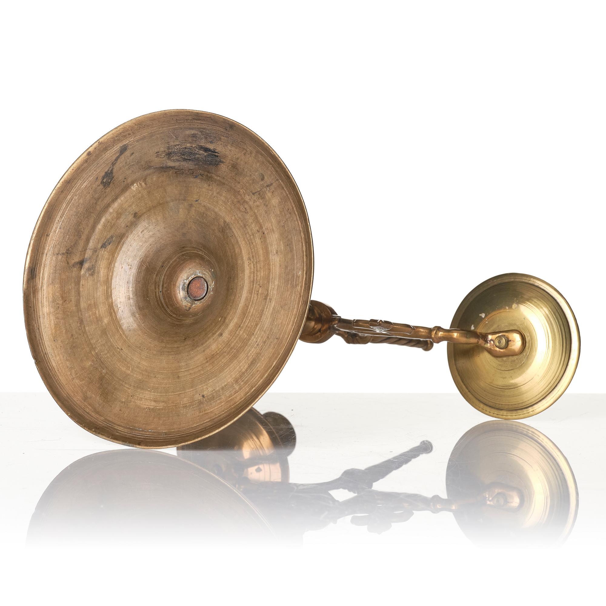 A baroque brass two-branch candelabra, Northern Europe/Sweden, 17th century.