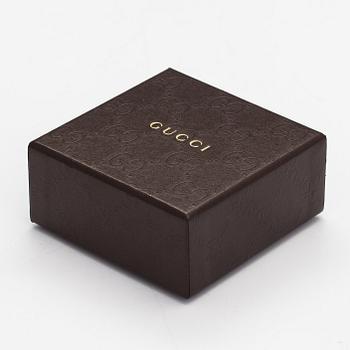 Gucci, A pair of earrings, bracelet, ring and necklace made of sterling silver. Marked Gucci, Made in Italy.