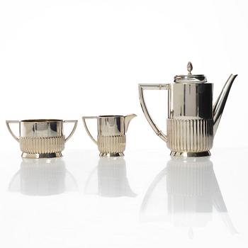 Guldsmedsaktiebolaget (GAB), A Swedish silver coffee pot, cream jug and sugar bowl, mark of GAB, Stockholm 1918-1919.