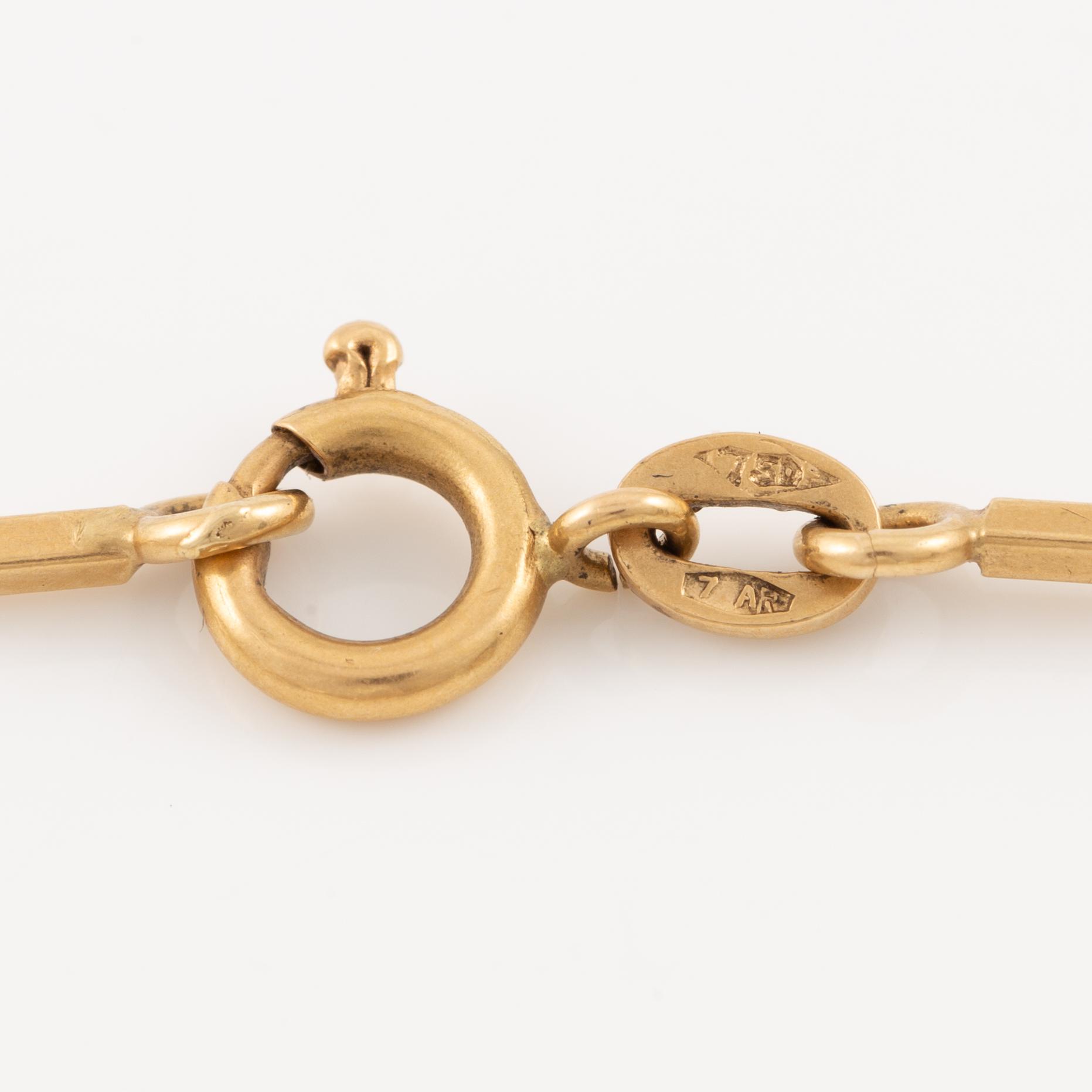 Bracelet 18K gold with cultured pearls.