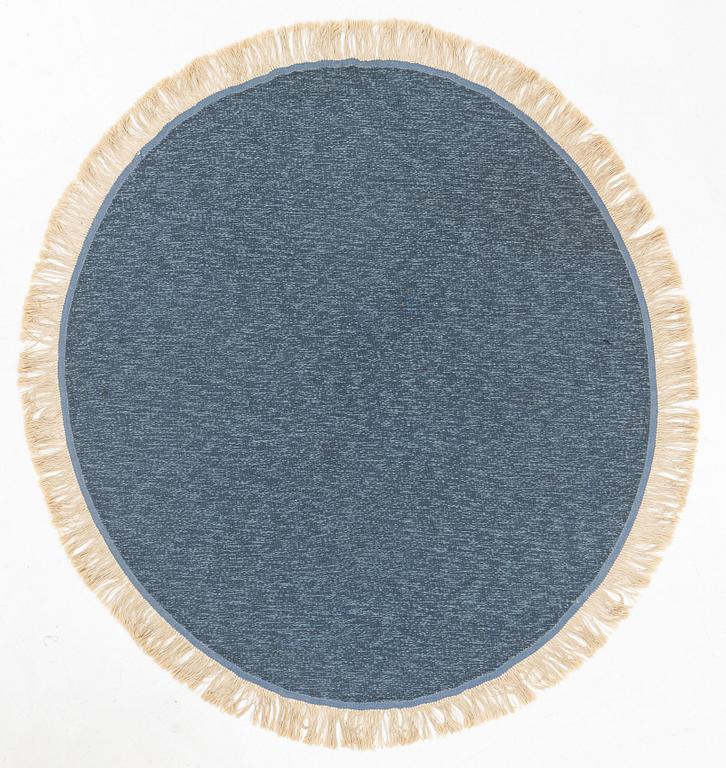 A rug, diameter circa 188 cm.