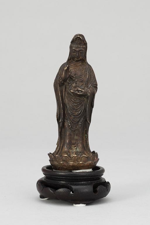 A Chinese 18th century bronze figure of Guanyin.