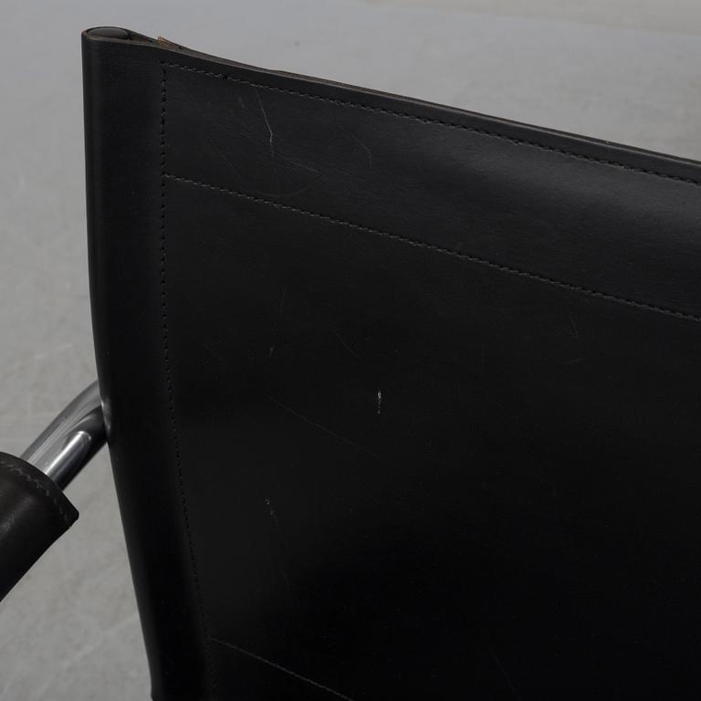 TORD BJÖRKLUND, a pair of 'Klinte' tubular steel easy chairs from IKEA.