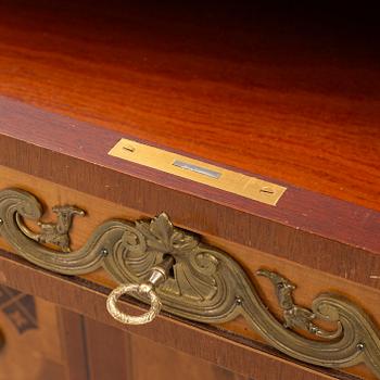 A Gustavian style chest of drawers, mid 20th Century.