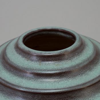 A vase designed by Ewald Dahlskog in 1930. Manufactured by Bo Fajans, Gävle.