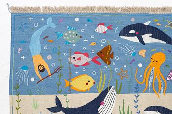 A hand-embroidered Kelim rug, 185 x 122 cm.