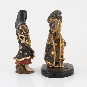 A pair of Japanese porcelain figurines, 20th century,